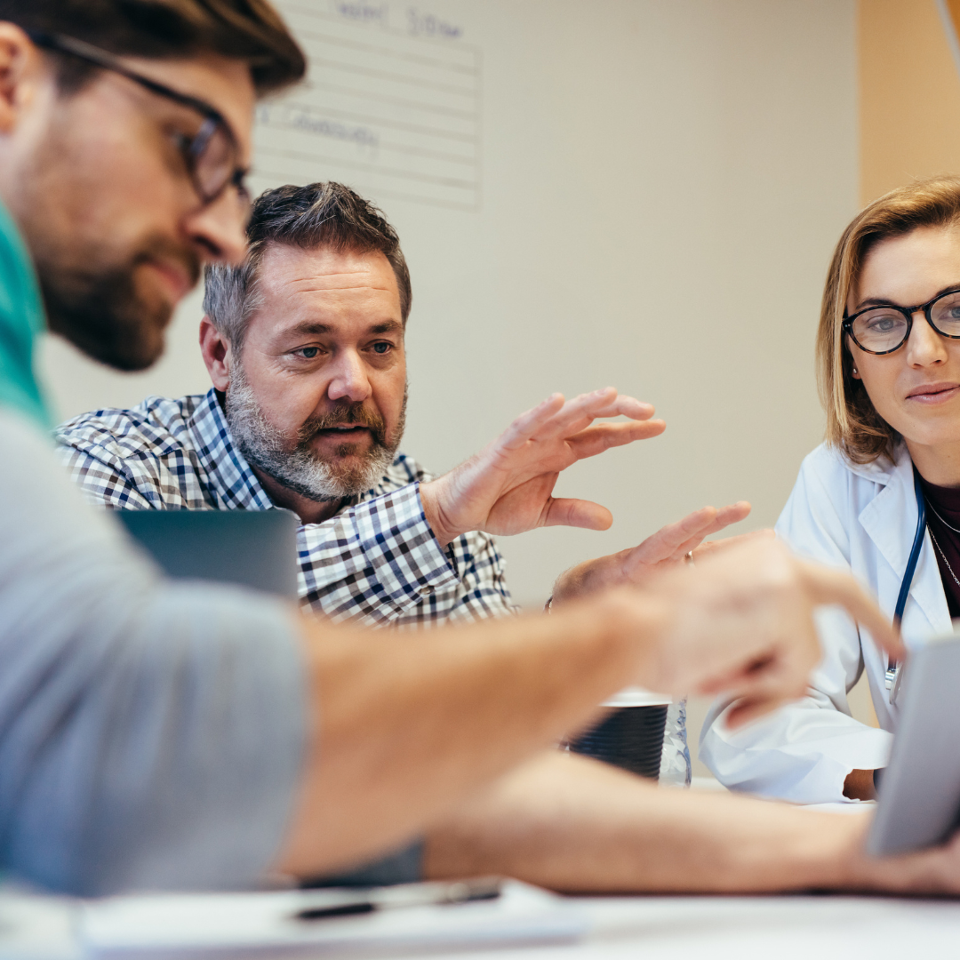 Doctors in a group practice discussing patient care